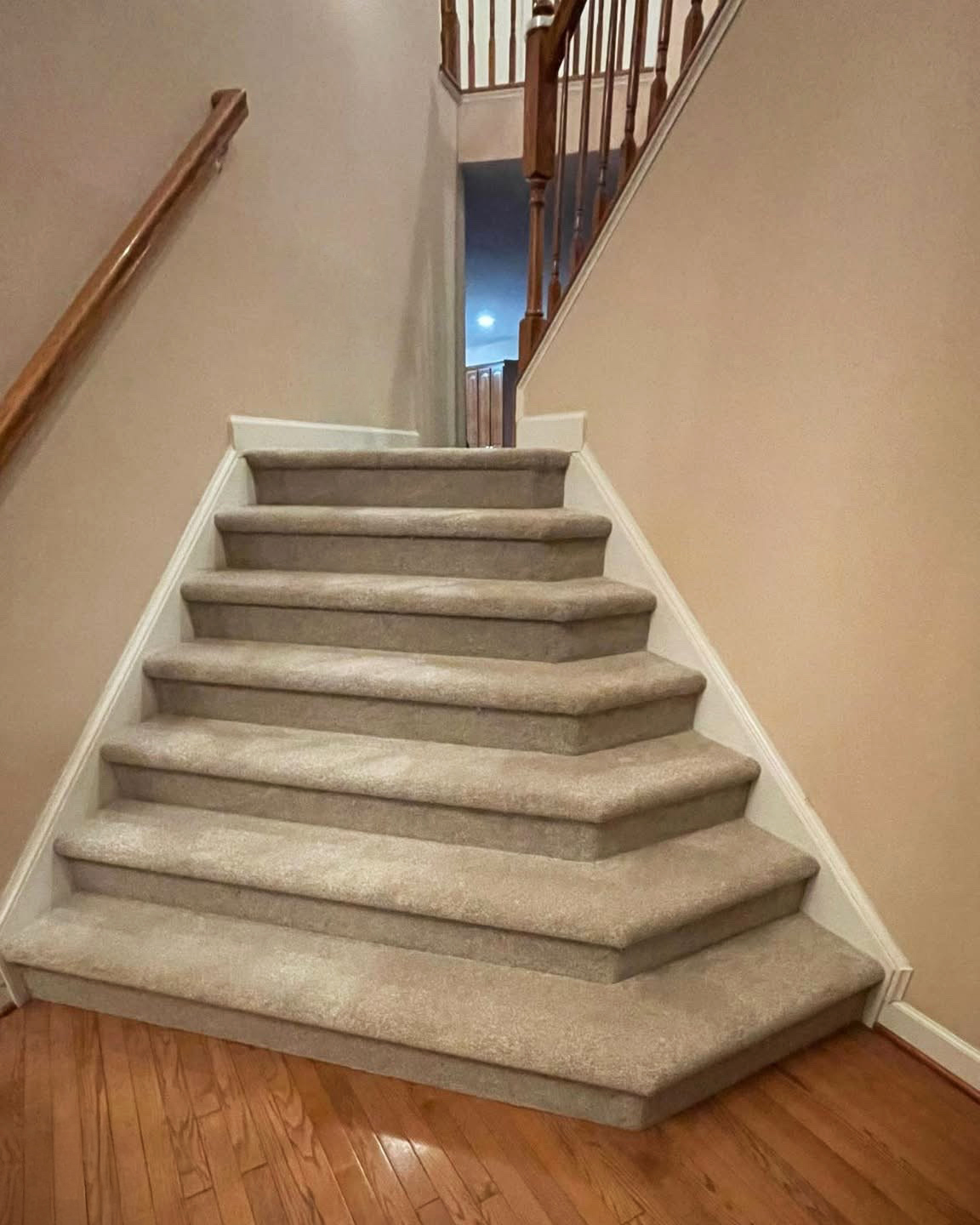 Beige carpet on stairs